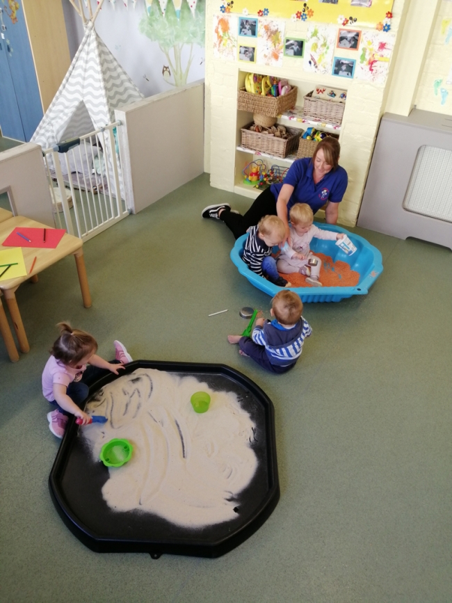 Babies in sand and lentils in their room